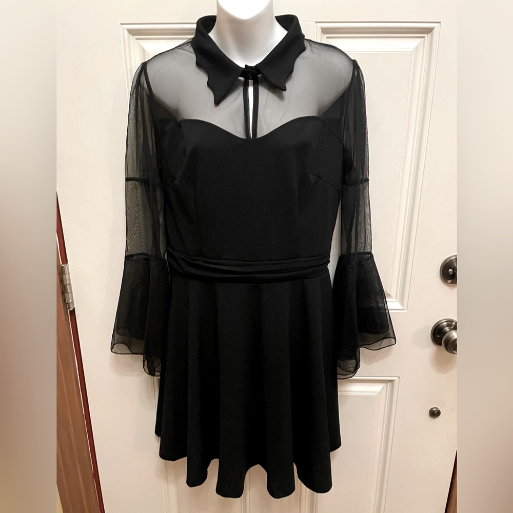 Black XL stunning dress with a scalloped collar and sheer top.
